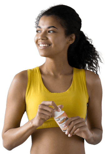 Sporty young woman holding AdvaLife supplements.