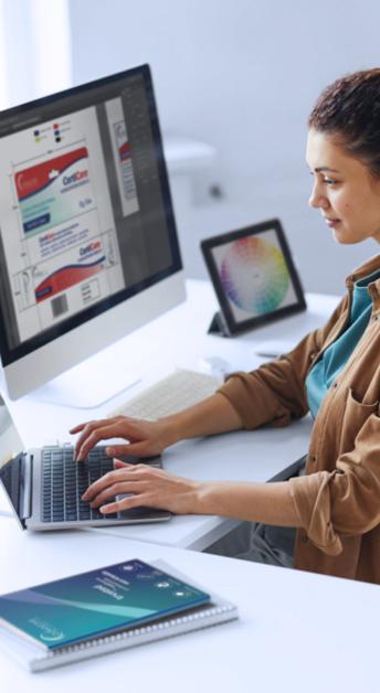 Designer preparing product packaging design before manufacturing.