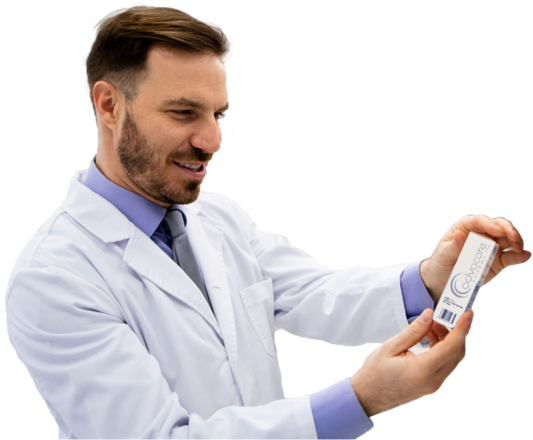 Pharmacist holding a package of a pharmaceutical product.
