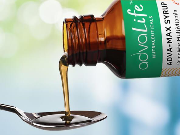 Spoon containing syrup dietary supplements. Spoon containing syrup dietary supplements.