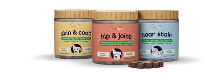 Wooden lid jars of AdvaMate soft chews for pets.