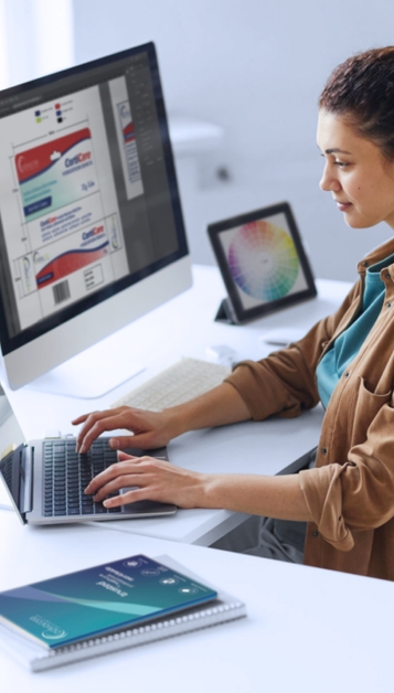 Designer preparing product packaging design before manufacturing.