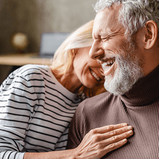 Old couple happy because of their generally good health.